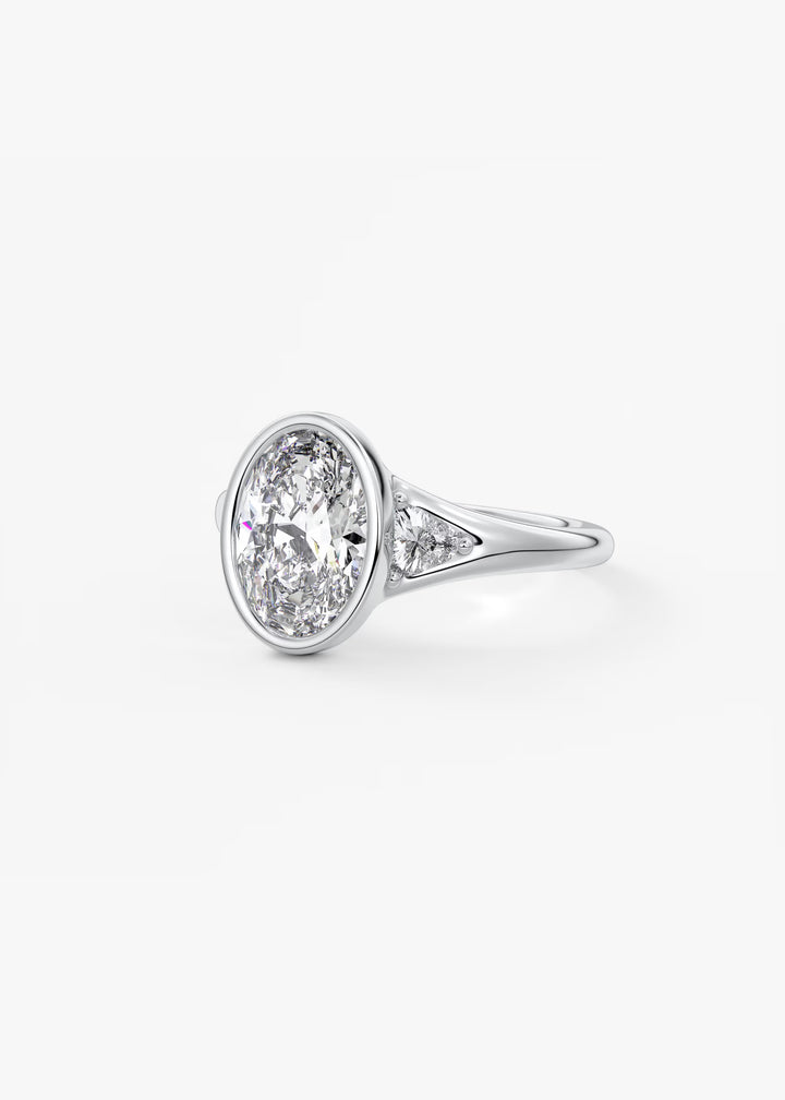 The Solene Bezel Set Oval & Trillion Split Shank Engagement Ring#material_white