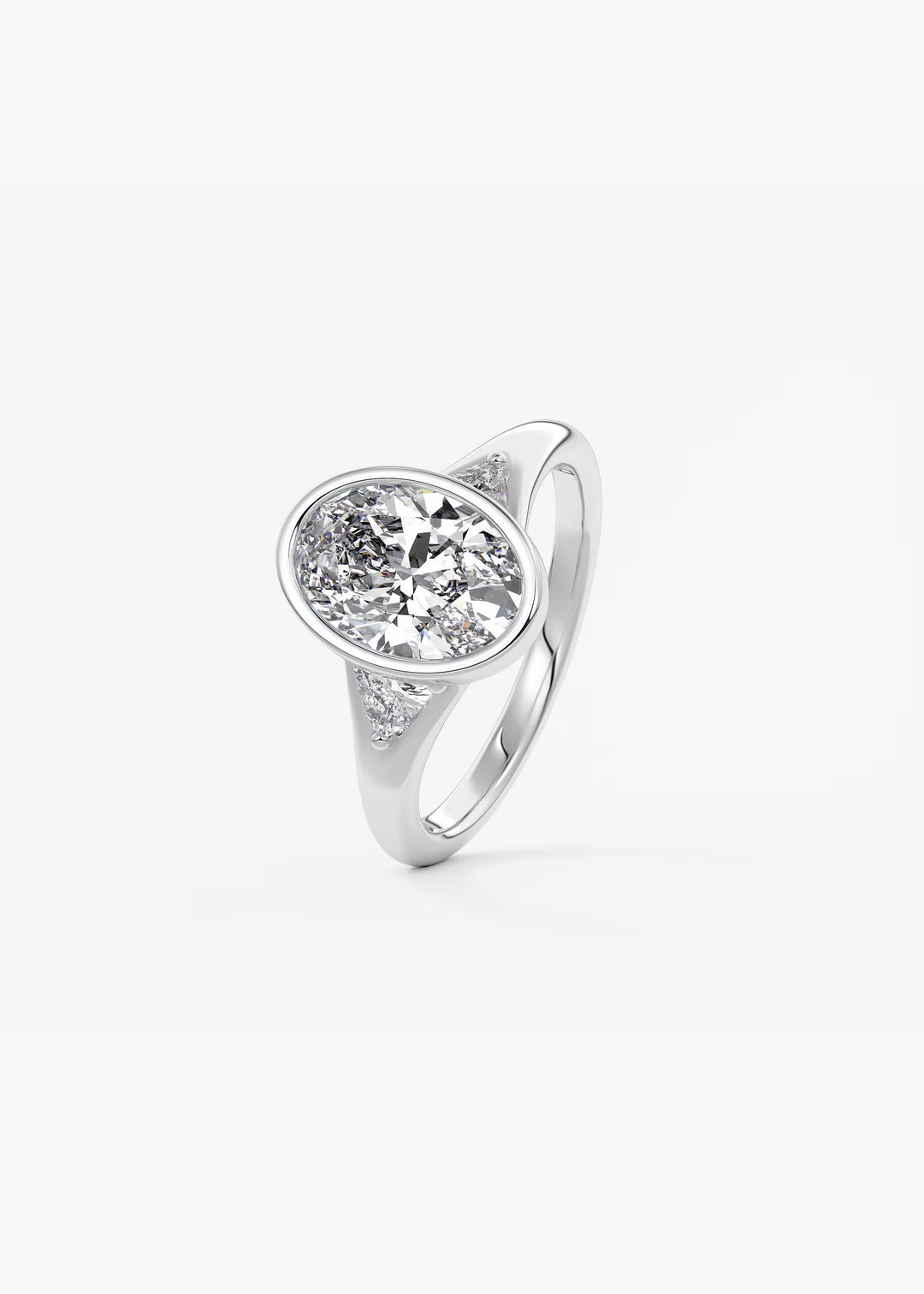 The Solene Bezel Set Oval & Trillion Split Shank Engagement Ring#material_white