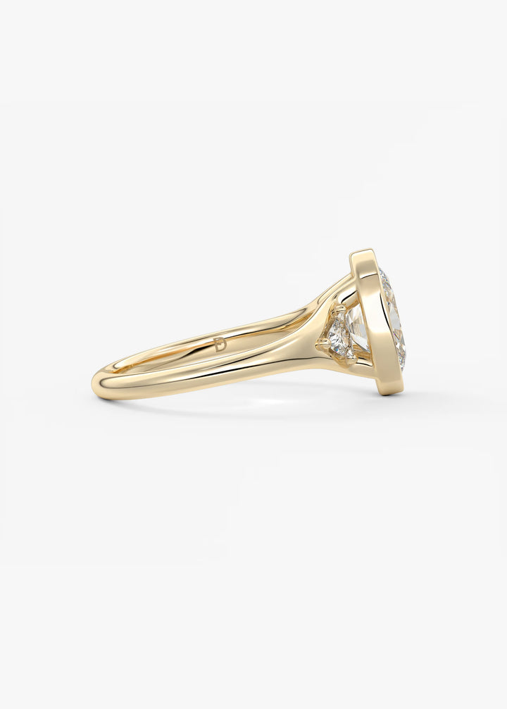The Solene Bezel Set Oval & Trillion Split Shank Engagement Ring#material_gold
