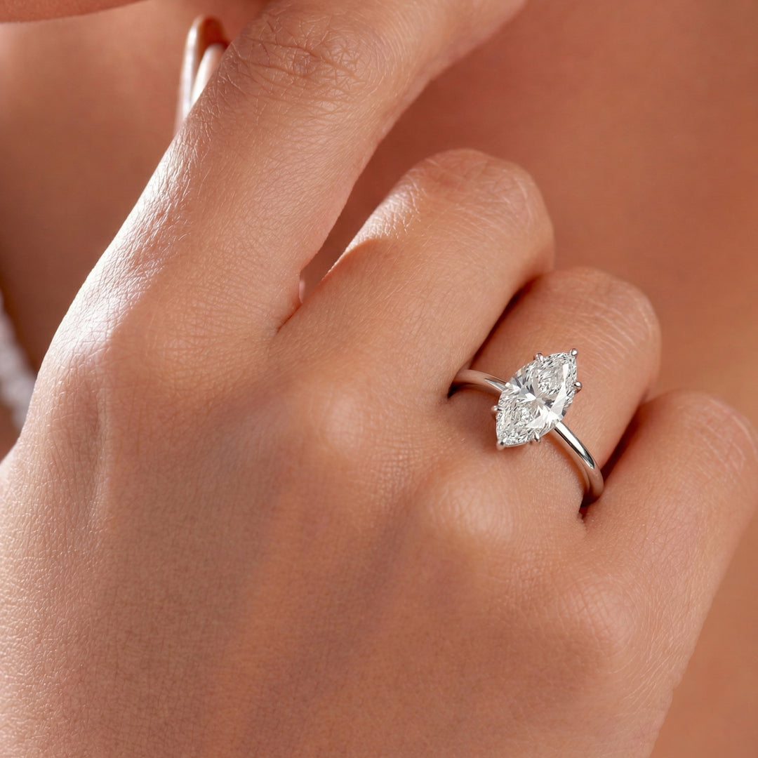 The Solitaire Phoebe Marquise White Gold #material_white