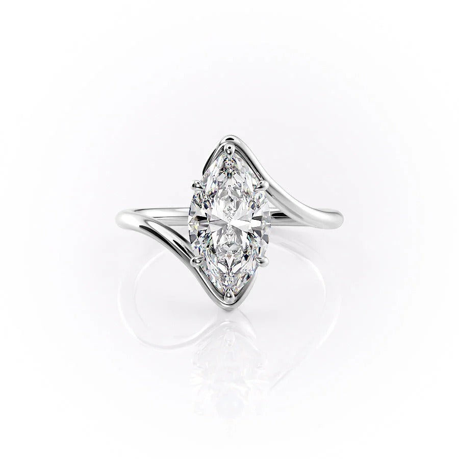 Diamond ring with a marquise-shaped center stone on a white background #material_white