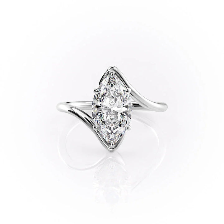 Diamond ring with a marquise-shaped center stone on a white background #material_white