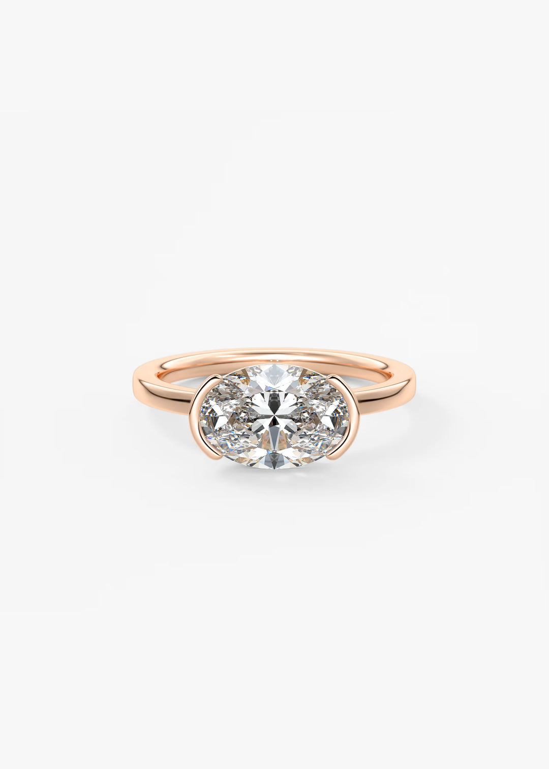 A rose gold ring with a large round-cut clear gemstone in a two-stone setting, shown on a clean white background.#material_rose