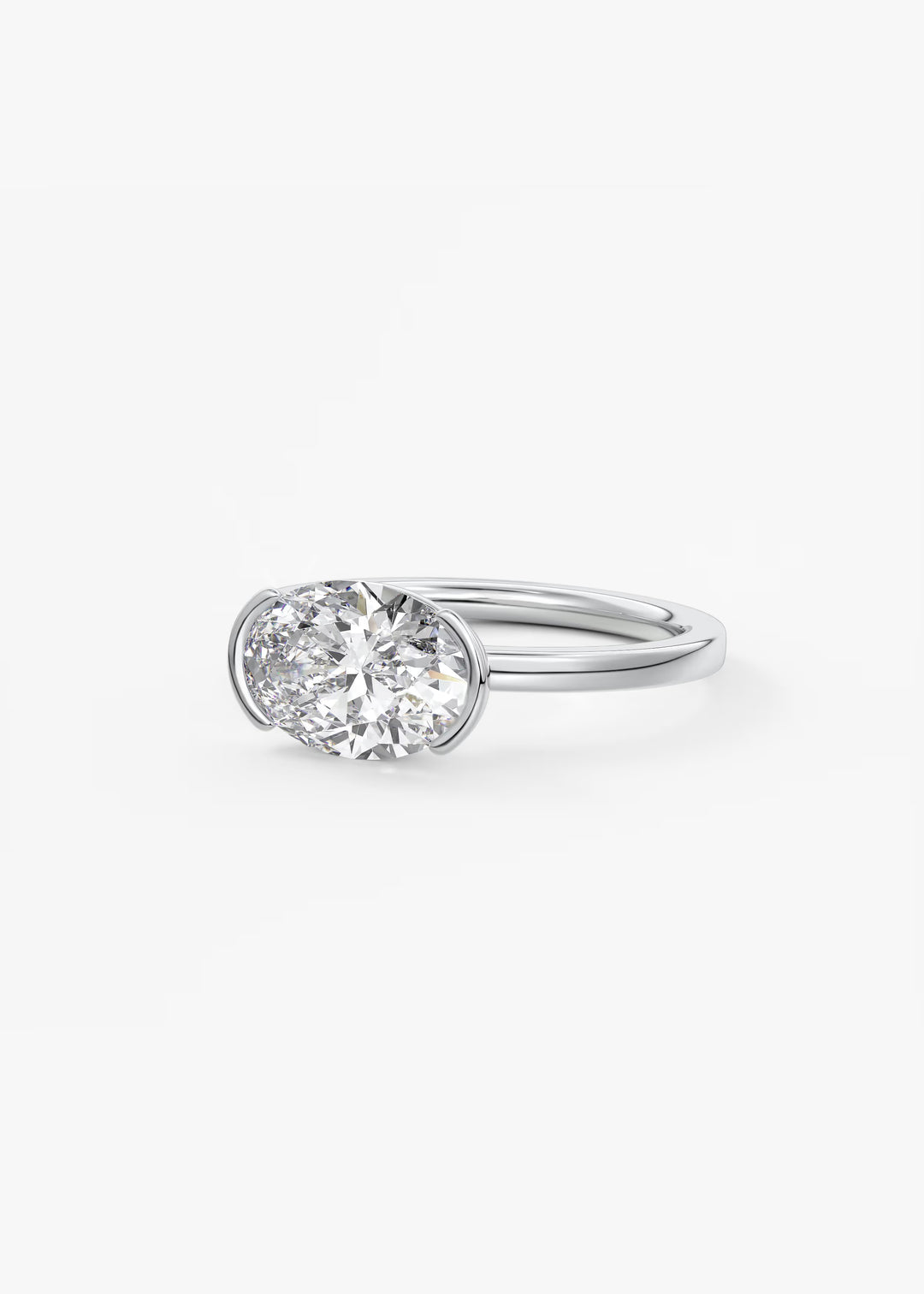 The Vela Horizon East West Oval Cut Engagement Ring with Half Bezel#material_white