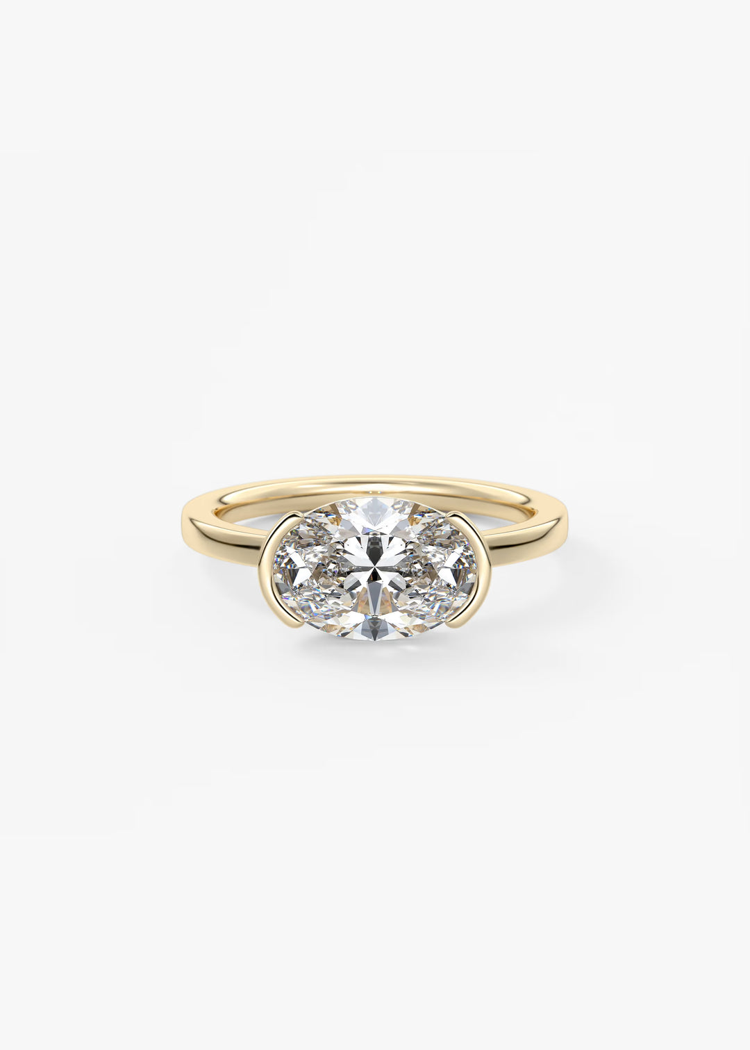 A yellow gold ring featuring a round brilliant-cut diamond in a double-row setting, presented on a clean white background.#material_gold