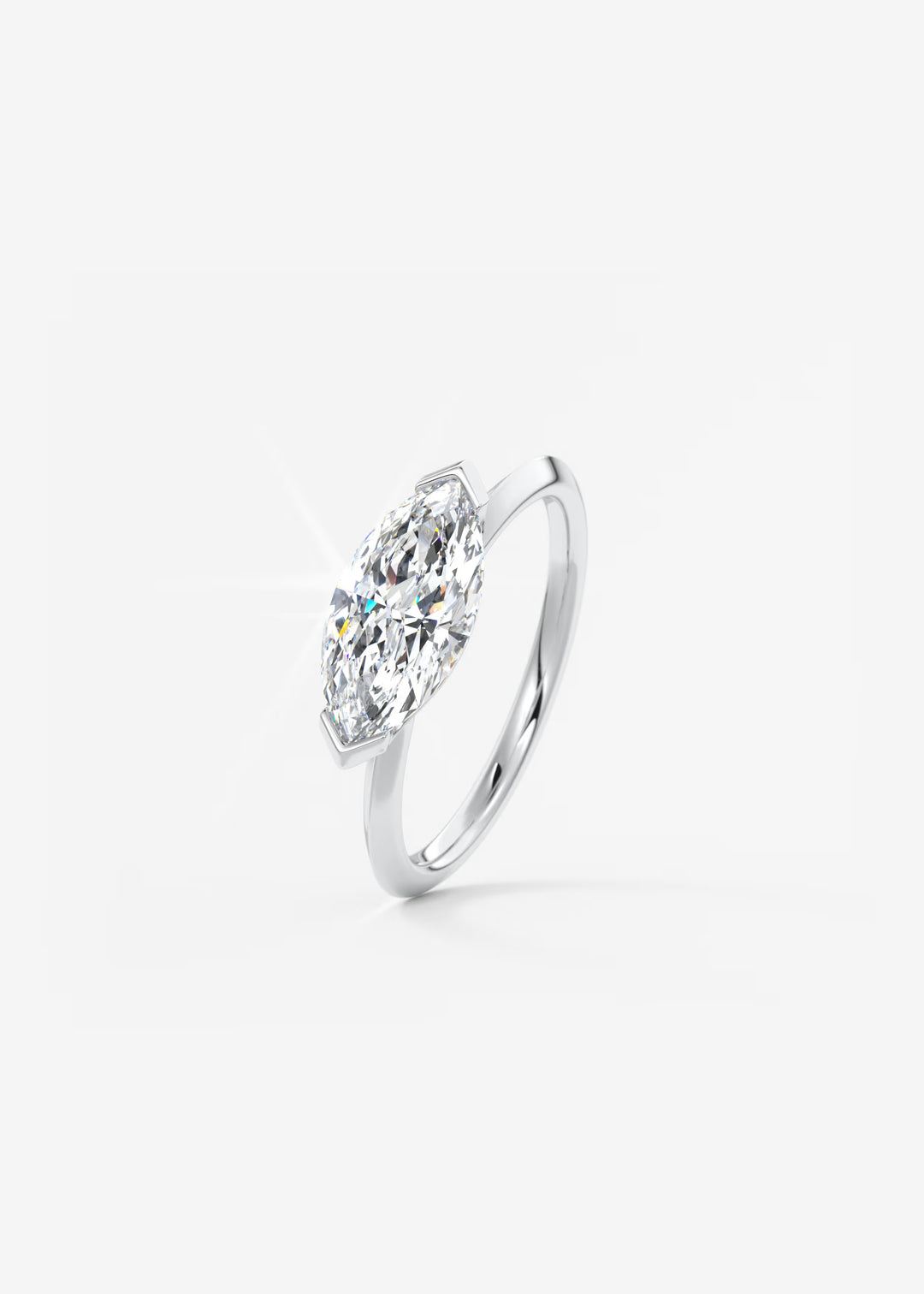 The Vela East West Marquise Cut Engagement Ring with Half Bezel#material_white