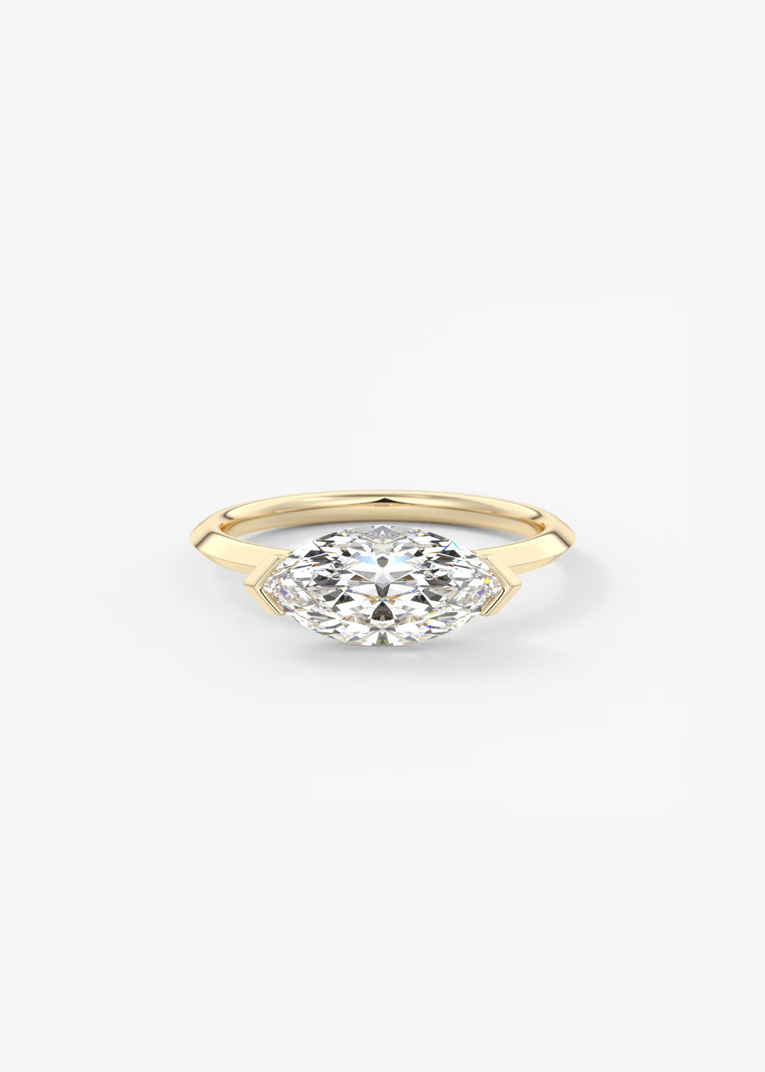 A yellow gold marquise-cut diamond engagement ring on a clean white background.#material_gold