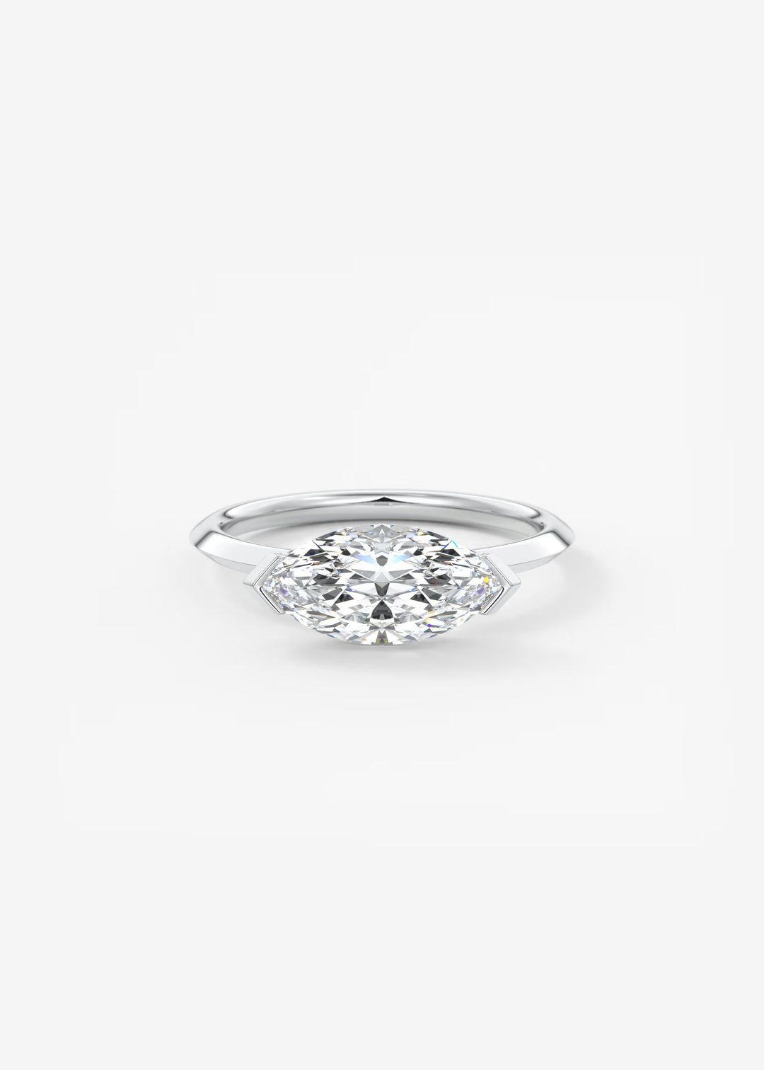 A silver marquise-cut diamond engagement ring on a clean white background.#material_white