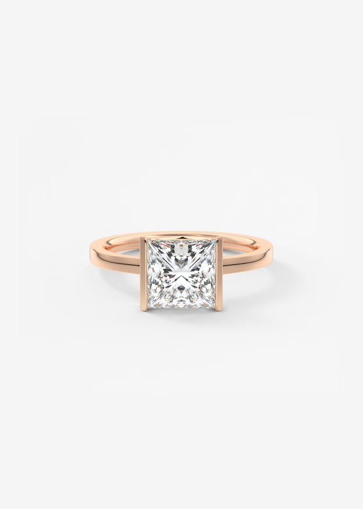 A classic princess-cut diamond engagement ring in a rose gold setting, centered on a clean white background.#material_rose