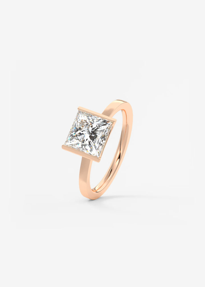 The Vela Princess Cut Engagement Ring with Half Bezel#material_rose