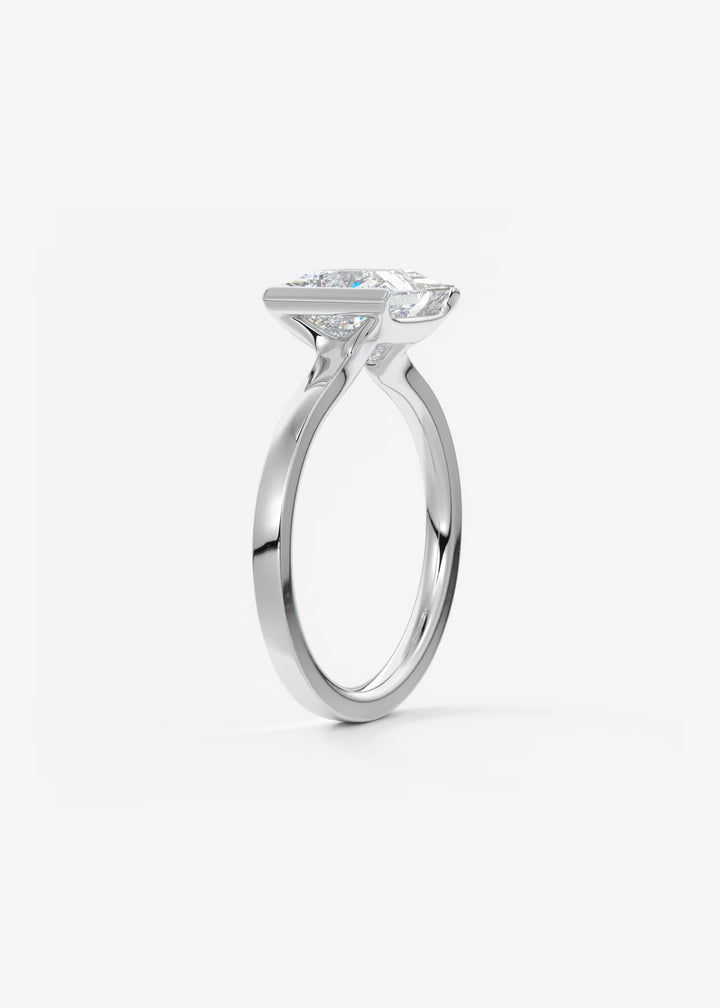 The Vela Princess Cut Engagement Ring with Half Bezel#material_white