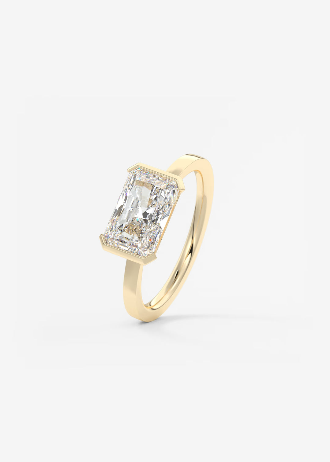 The Vela East West Radiant Cut Engagement Ring with Half Bezel#material_gold