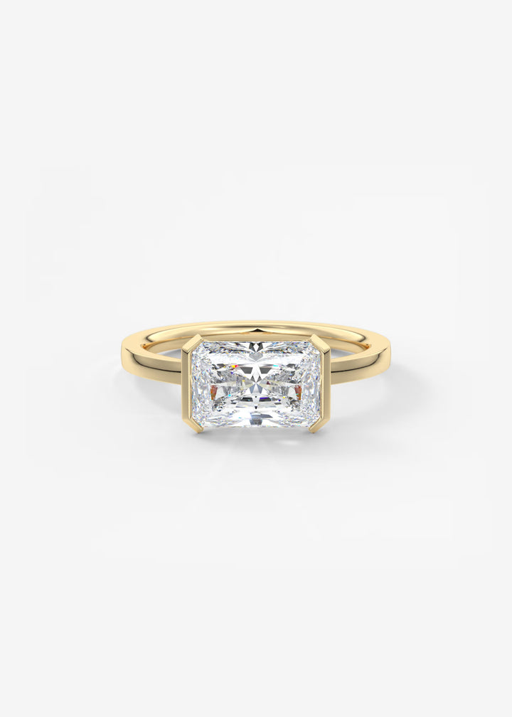 Gold ring with a diamond on a white background#material_gold