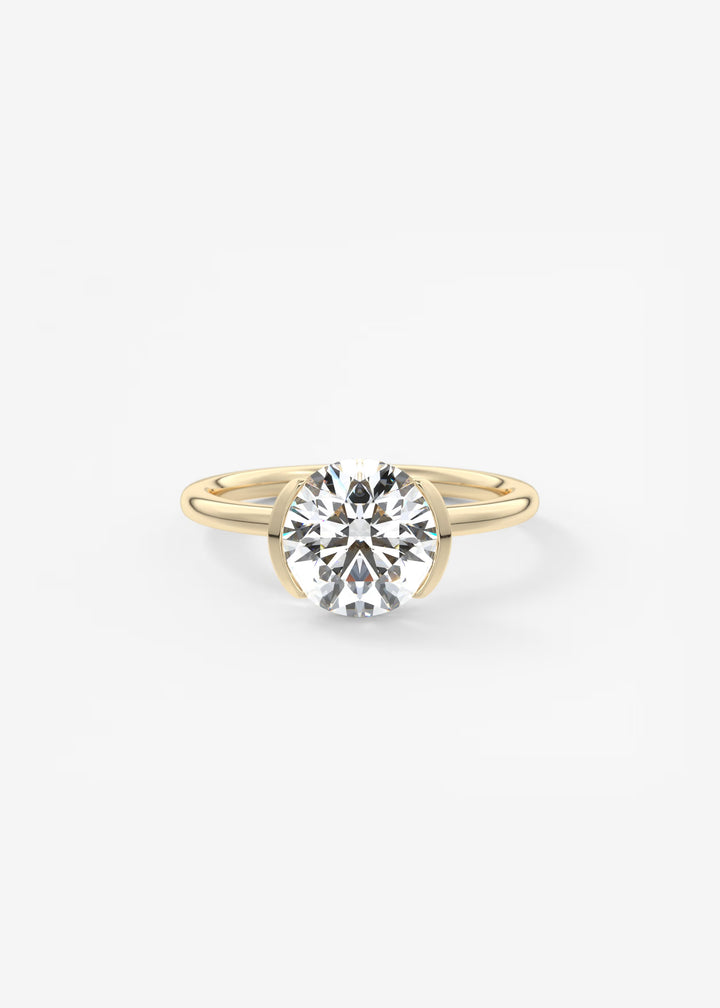 Gold ring with a diamond on a white background#material_gold