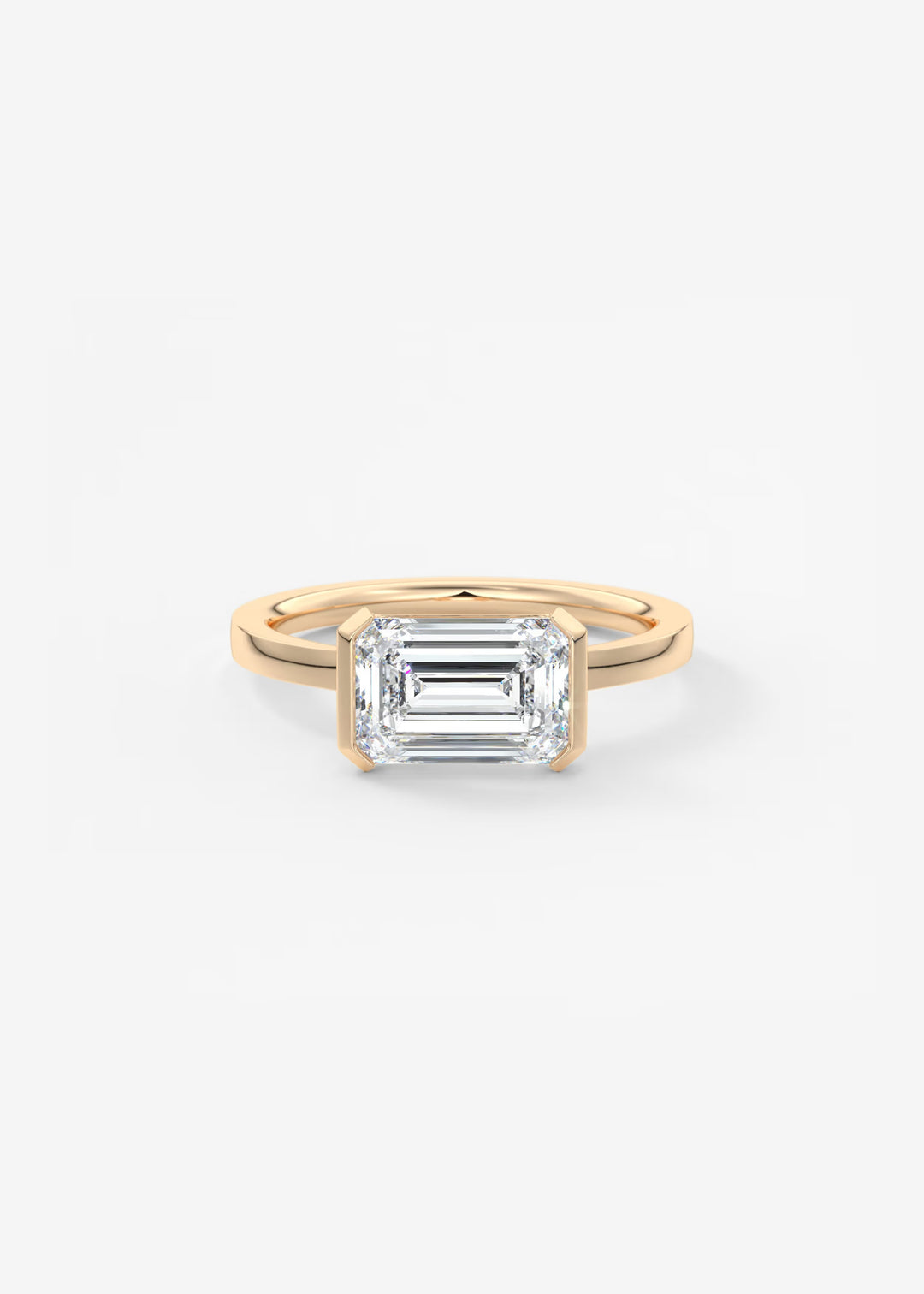 Gold ring with a rectangular diamond on a white background#material_rose