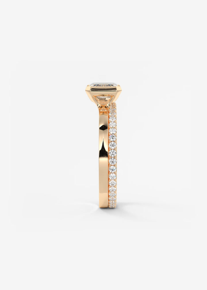 The Vela East West Emerald Cut Engagement Ring with Half Bezel#material_rose