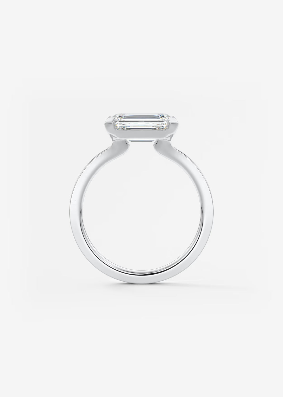 The Vela East West Emerald Cut Engagement Ring with Half Bezel#material_white