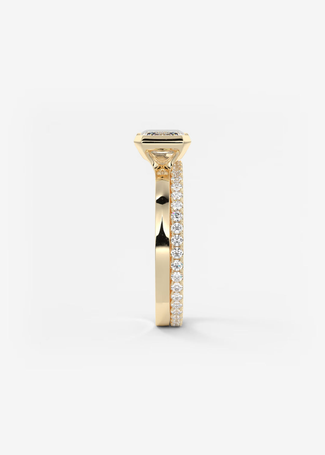 The Vela East West Emerald Cut Engagement Ring with Half Bezel#material_gold